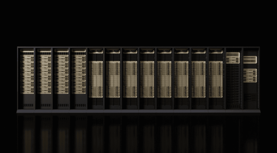 Wide, front-facing view of a row of high-performance server racks in a dark environment.